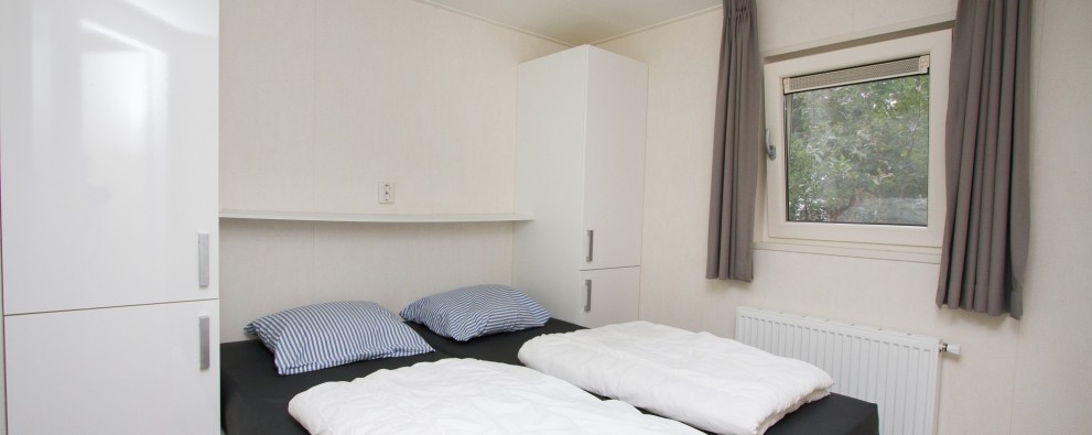 Ouderslaapkamer Bos-chalet - kleiner.jpg