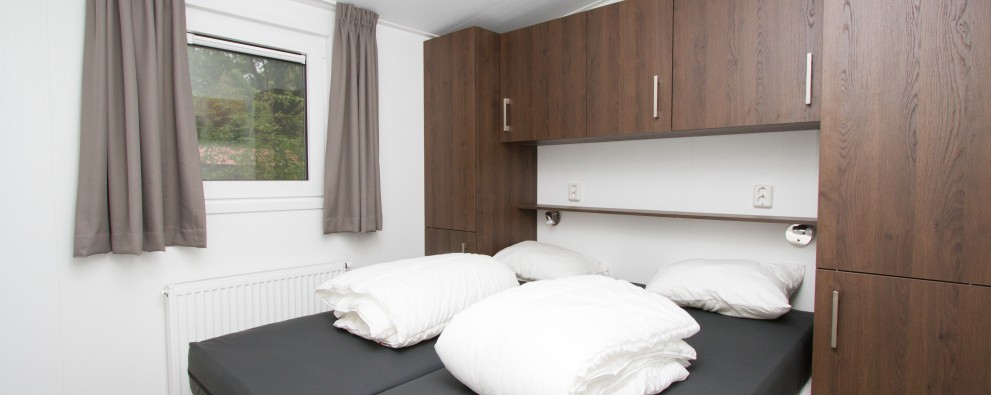 Ouderslaapkamer chalet met overdekt terras