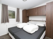 Ouderslaapkamer chalet met overdekt terras